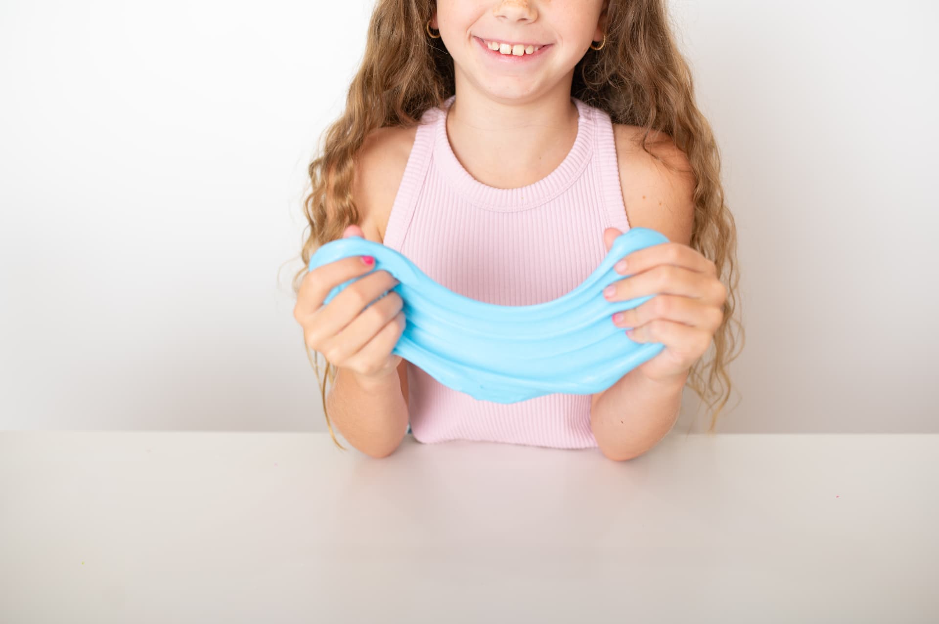 Ari stretching bright blue slime